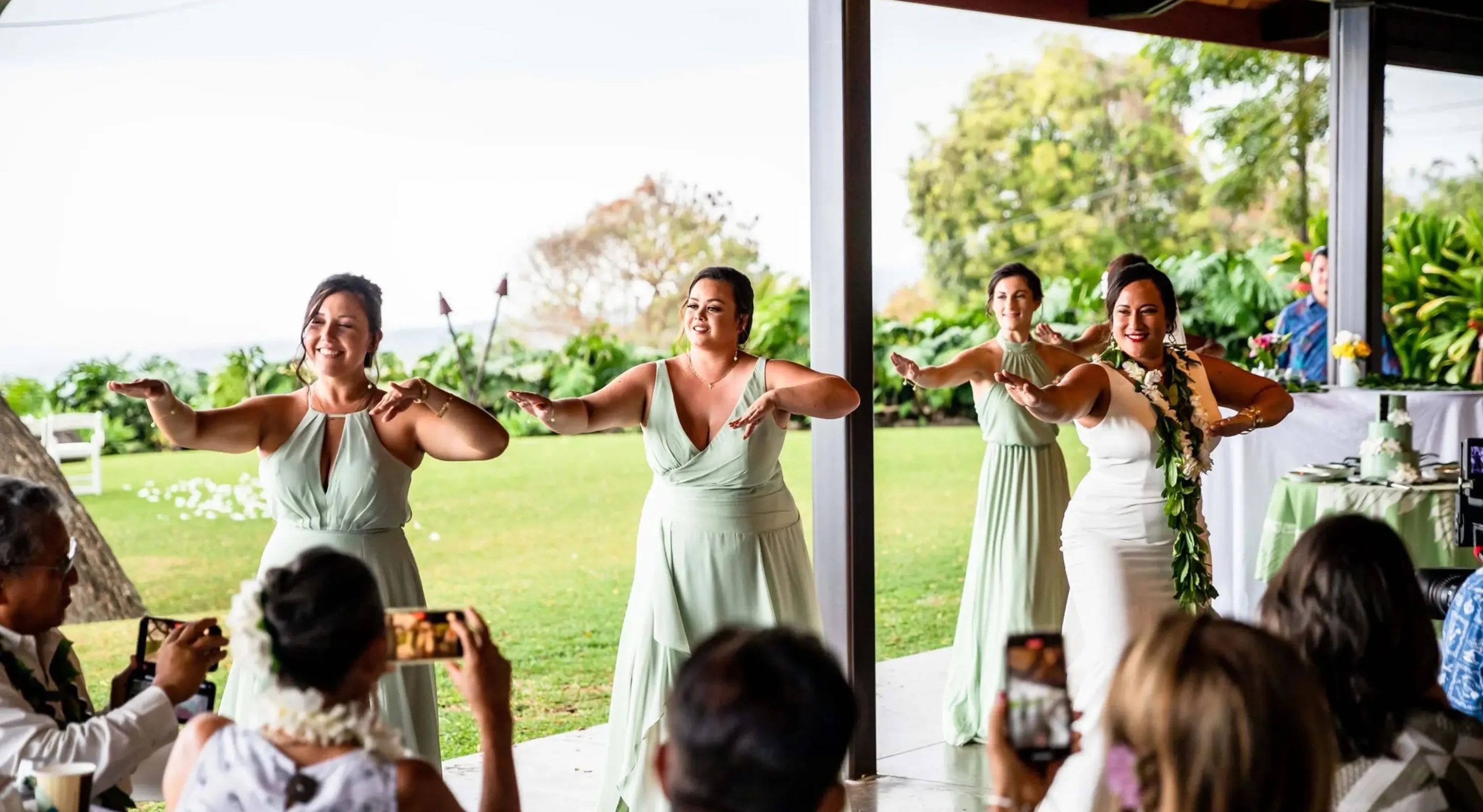 Bridal party performing Hula for wedding reception at Malulani Pavilion